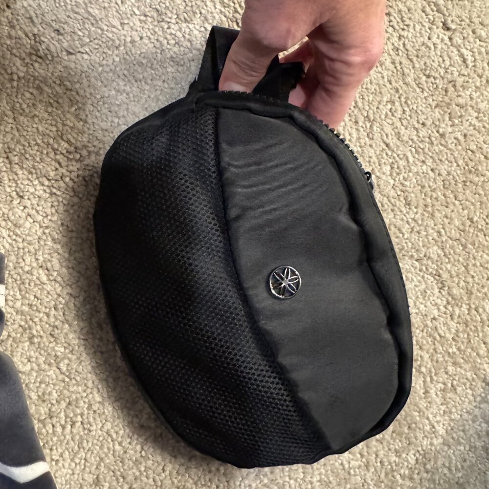 Black across the body bag, never used!